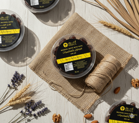 تمر مجدول جامبو بالمكسرات عبوة نص كيلو